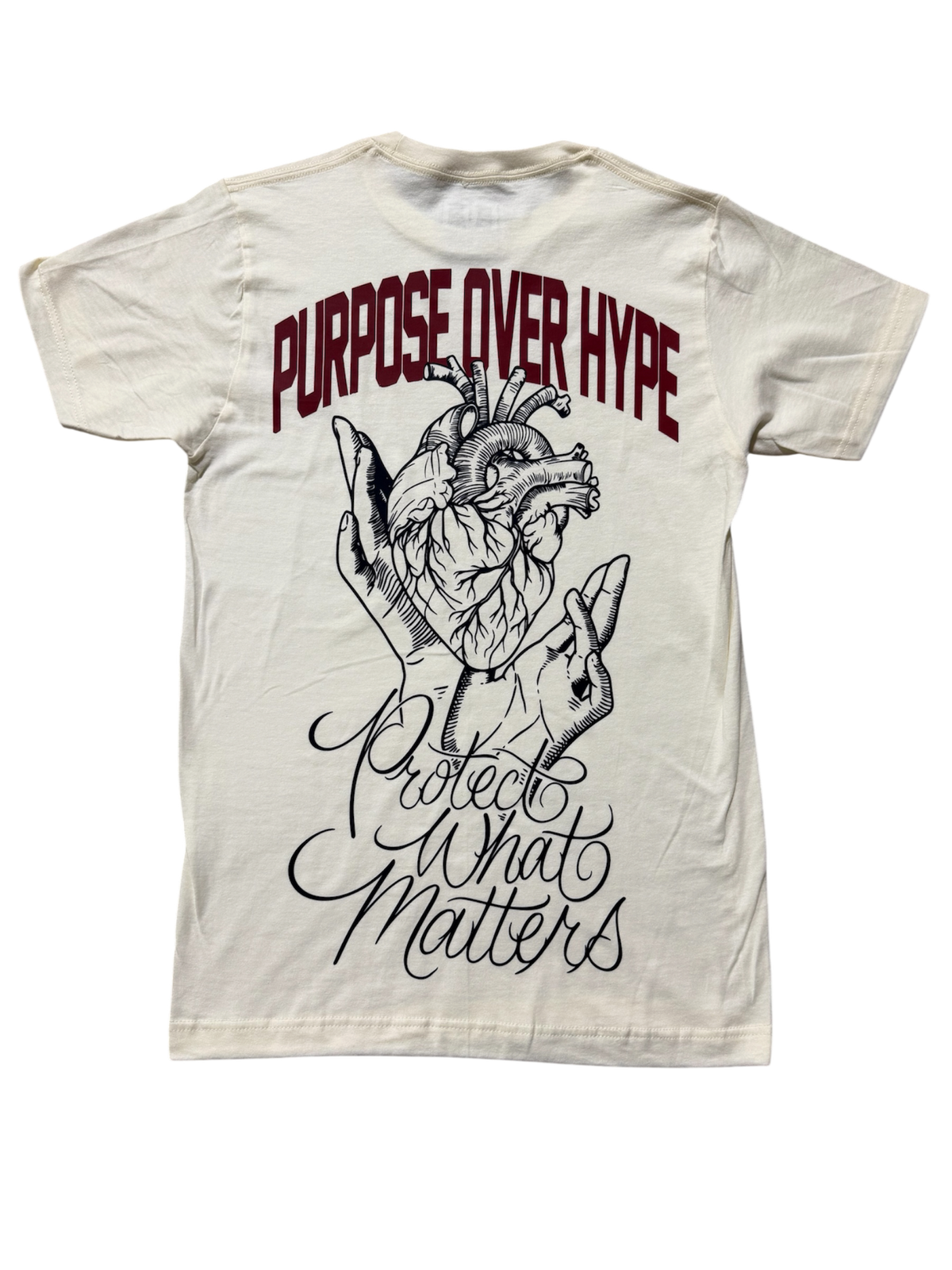 DMC Uniform 005 Purpose Over Hype Tee in Legacy vintage cream, back view with Protect What Matters artwork